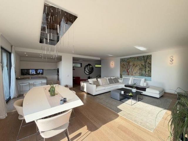 APPARTAMENTO DI 3,5 LOCALI ARREDATO CON VISTA LAGO, GIARDINO E TERR.