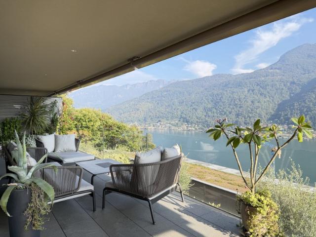 APPARTAMENTO DI 3,5 LOCALI ARREDATO CON VISTA LAGO, GIARDINO E TERRAZZE PANORAMICHE