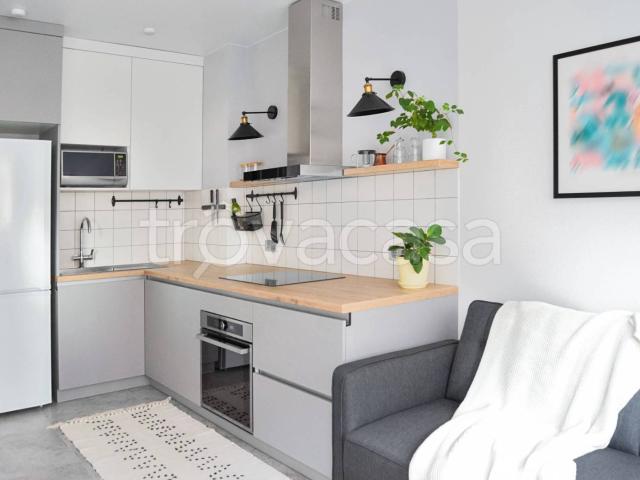 Appartamento in affitto a Carpi viale Nicolò Biondo, arredato, cucina a vista, studio TrovaCasa