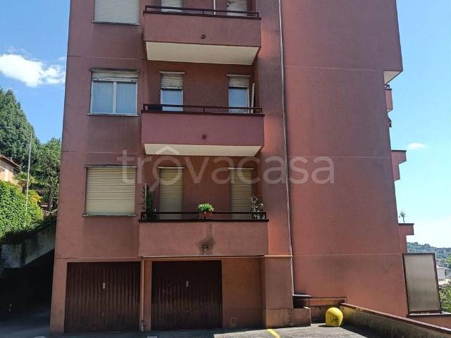 Appartamento in affitto a Como, parzialmente arredato, posto auto coperto, cantina TrovaCasa