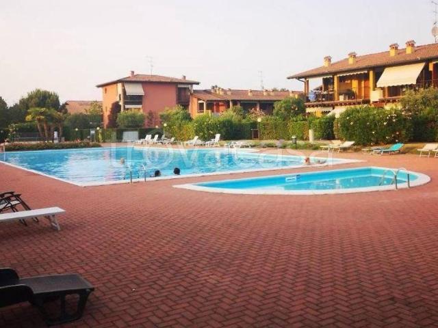 Appartamento in affitto a Desenzano del Garda via Giunio Bruto, 16, arredato, giardino privato, posto auto TrovaCasa