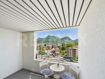 Appartamento in posizione centrale, vicino alla stazione, con vista aperta sulla città Lugano !