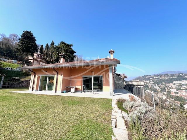 APPARTAMENTO NUOVO IN VILLA CON AMPI TERRAZZI E MAGNIFICA VISTA LAGO E CITTA'