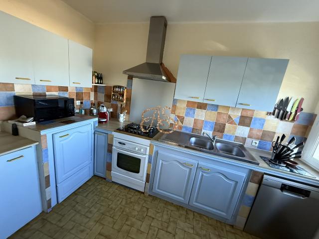 APPARTEMENT 4 CHAMBRES + GARAGE