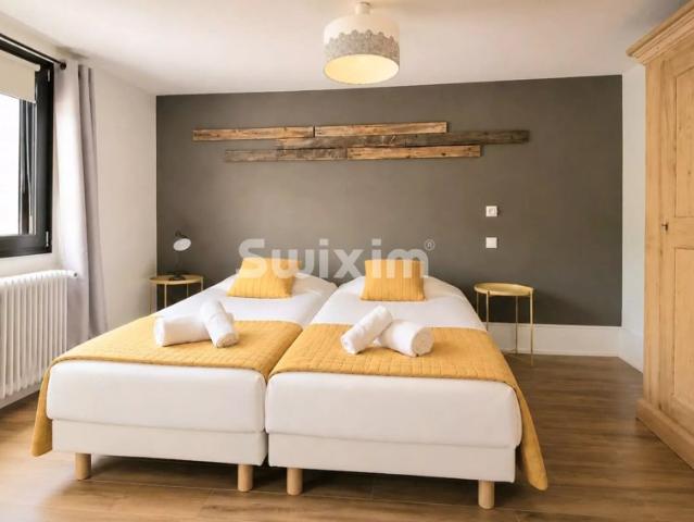 Appartement 4 pièces, trois chambres, combles et stationnement couvert