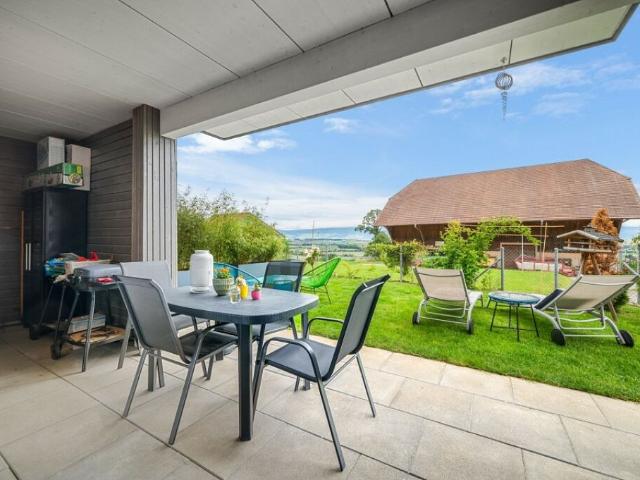 Appartement 4.5 pièces avec grand jardin privatif  confort moderne et cadre verdoyant à Russy