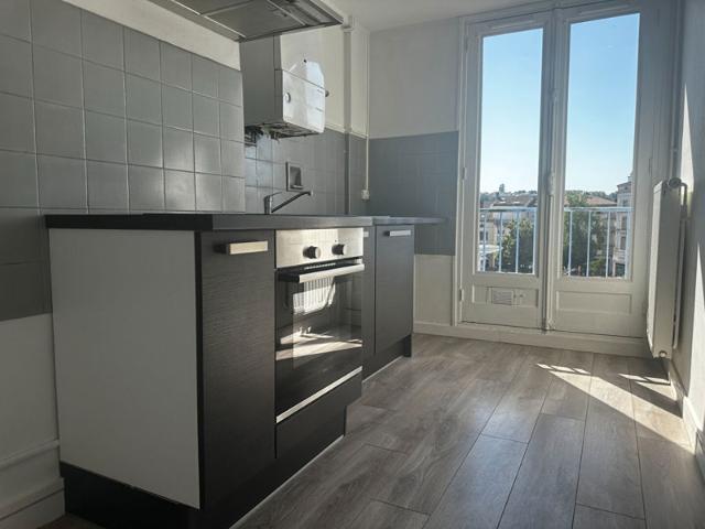 Appartement 57 m² Place des Vosges à Épinal Vue canal
