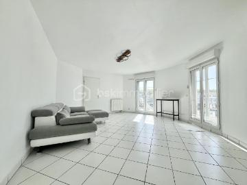 APPARTEMENT 75M2 AU DERNIER ÉTAGE