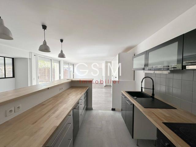 Appartement 107 m² 3 chambres en centre ville avec jardin