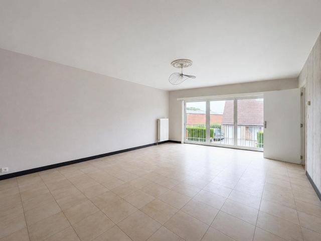 Appartement 2 chambres avec jardin privatif, garage et cave