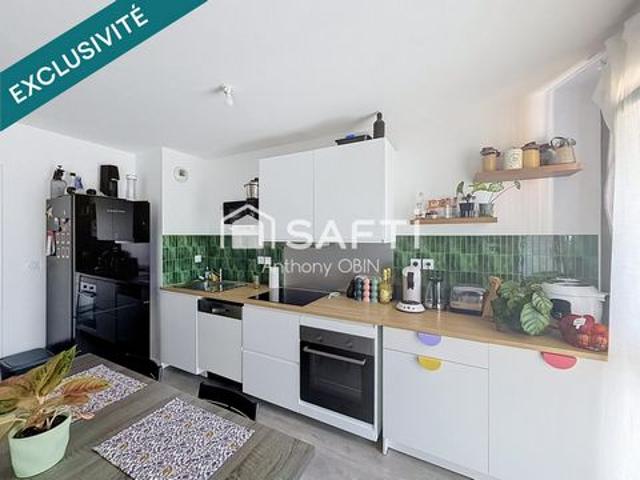 Appartement 2 chambres, 2 parkings, balcon