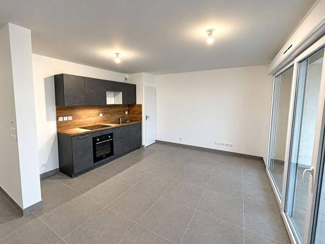 Appartement 2 pièces avec terrasse et place privative