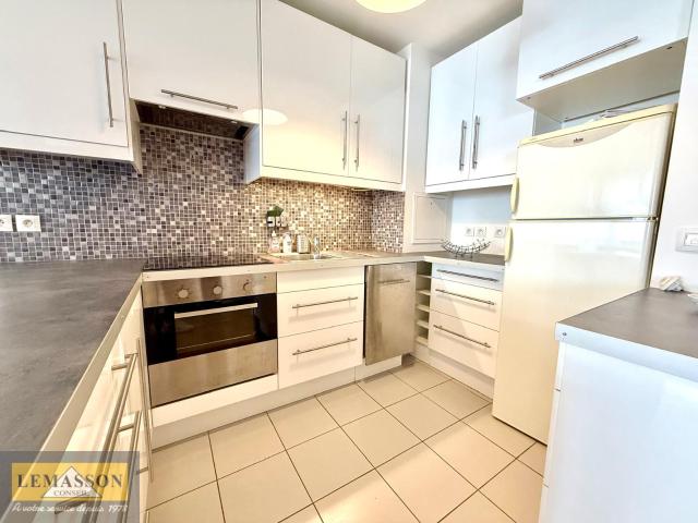 Appartement 2 pièces de 48 m2 avec balcon et parking en sous sol En plein centre ville