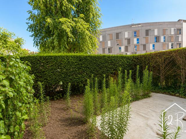 Appartement 2 pièces de 64,15 m2 Jardin privatif
