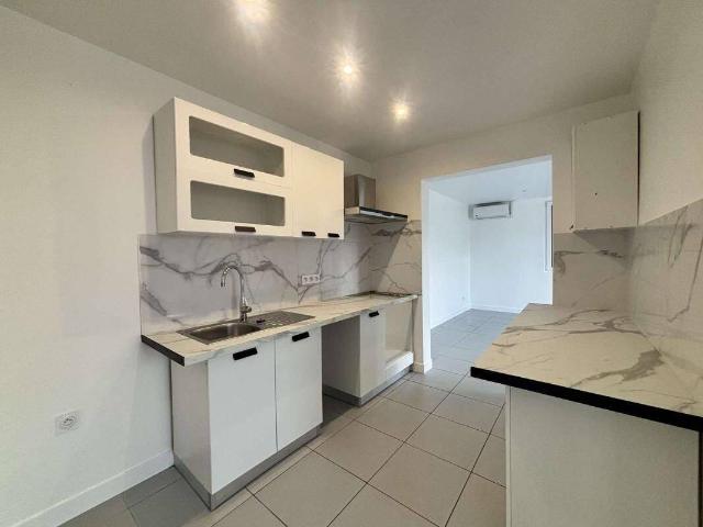 Appartement 3 pièces 2 chambres environ 55 m² avec jardin