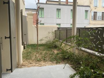 Appartement 3 pièces avec terrasse et jardin, centre ville
