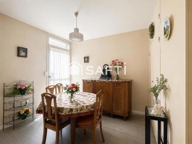 Appartement 3 pièces de 58 m² à rénover avec balcon, cave et stationnement