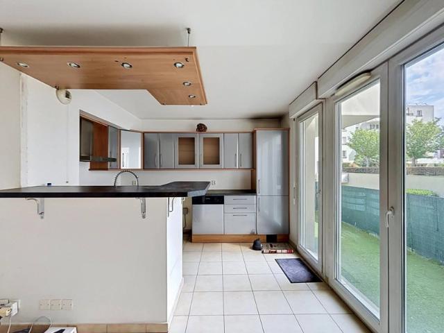 Appartement 3 pièces de 65m2 avec balcon et box