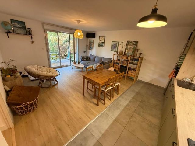 Appartement 3 pièces en rez de chausée de 61 m² Terrasse et Jard