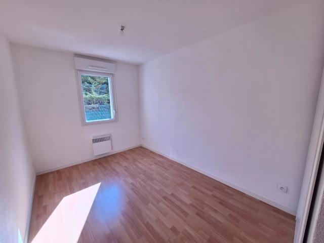 Appartement T3 à CHAMBRAY avec balcon et parking • Réf. TNG G0047