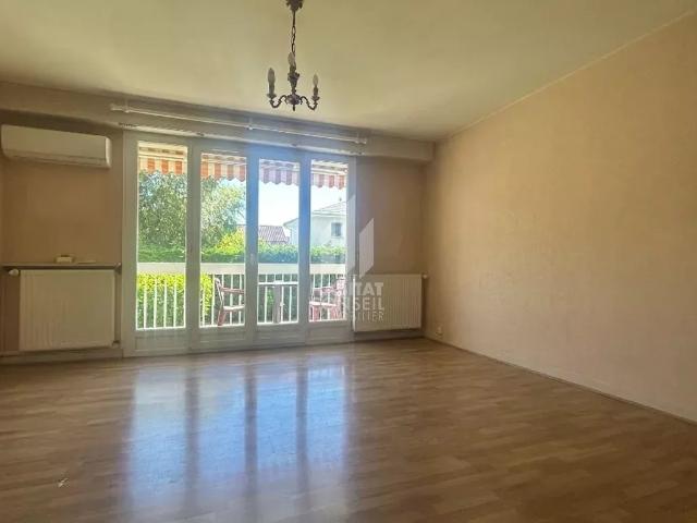 Appartement T3 avec balcon, cave et garage