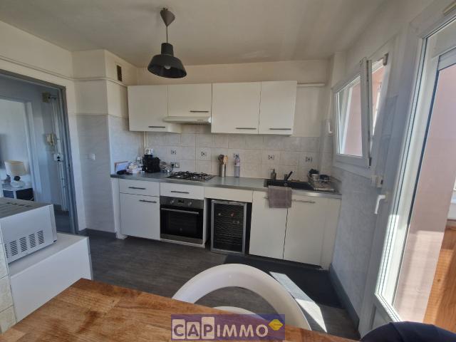Appartement T3 avec balcon et locataire en place