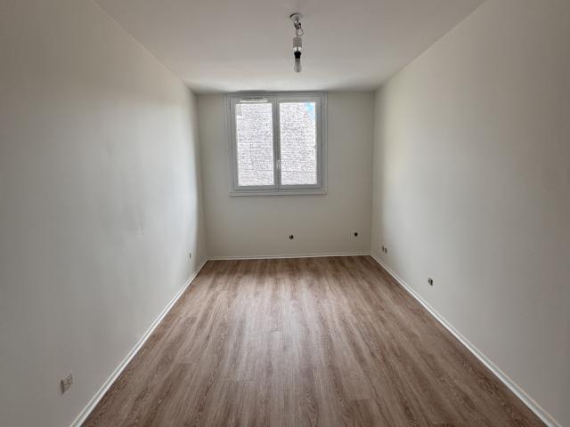 Appartement T3 avec balcon et stationnements