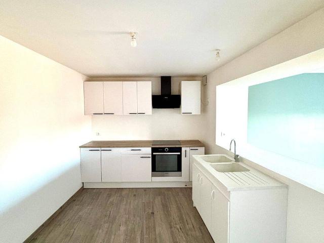 Appartement T3 en plein centre de Meximieux proche Gare