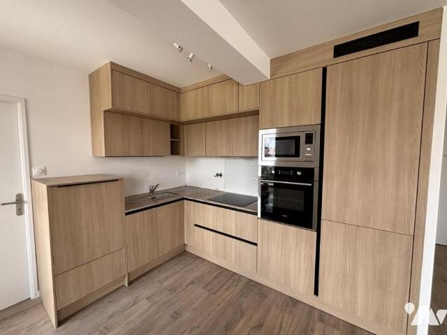 Appartement T3 neuf avec balcon et stationnement