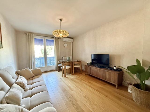 Appartement T3 rénové avec balcon, cave et parking sécurisé