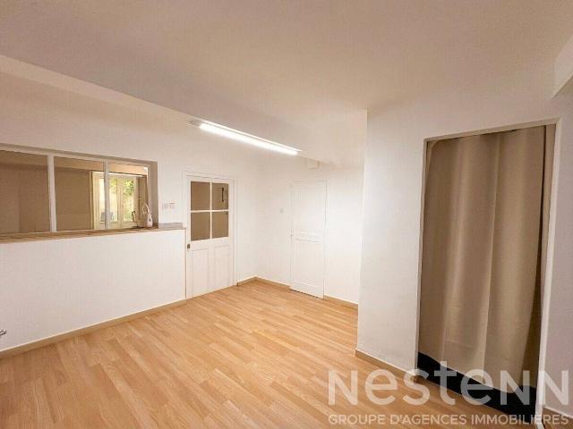Appartement T2 traversant de 53 m² avec jardin privatif et cave