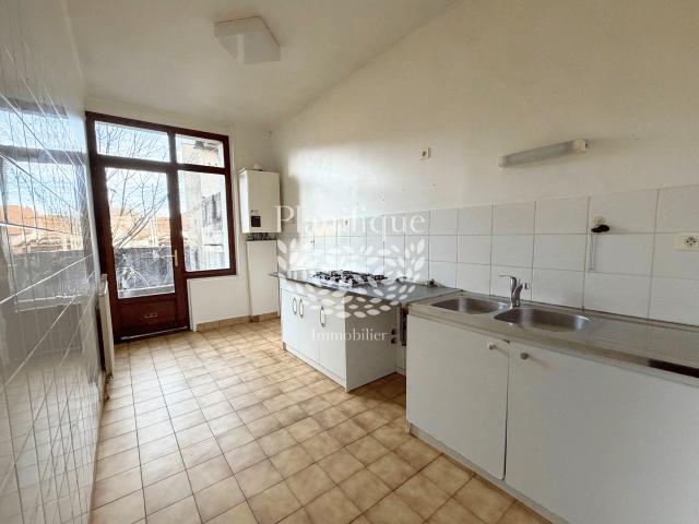Appartement T2 avec jardin privatif et cave