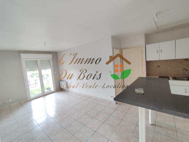 Appartement T2 avec place de parking et jardin partagé
