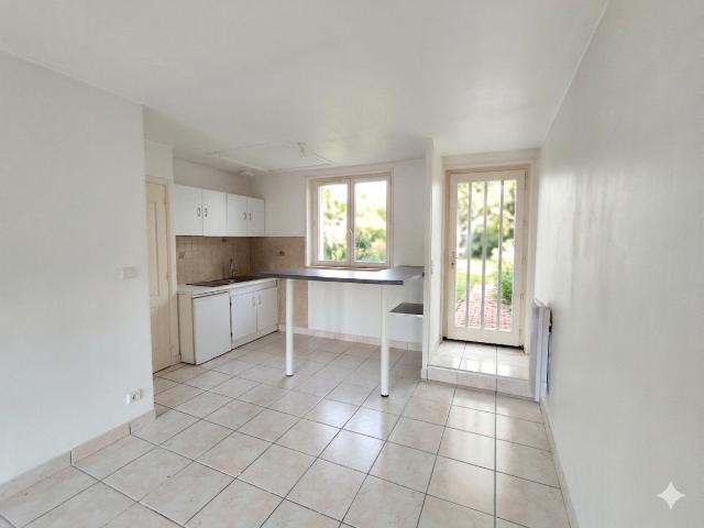 Appartement T2 avec place de parking et jardin partagé
