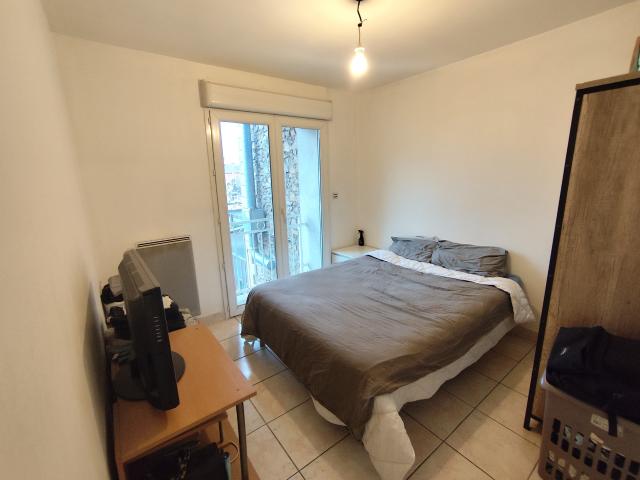 Appartement T2 avec place de parking et jardin partagé