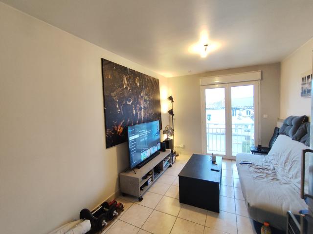 Appartement T2 avec place de parking et jardin partagé