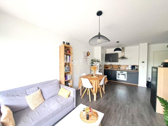 Appartement T2 avec terrasse et stationnement sécurisé