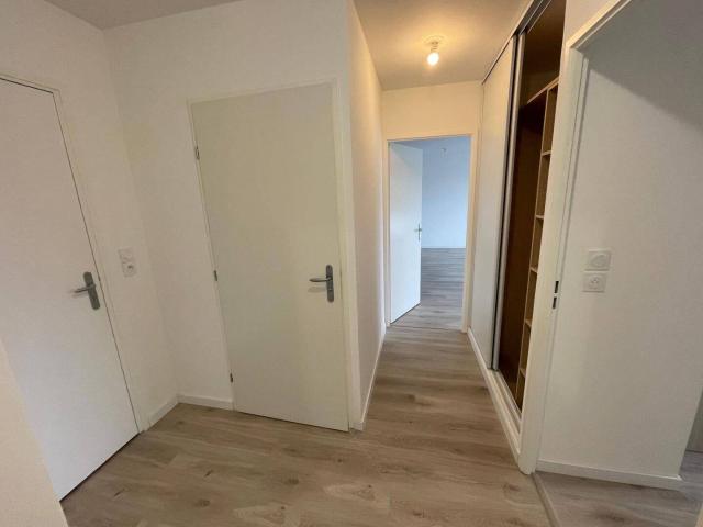 Appartement T4 avec balcons et places de stationnement sous sol