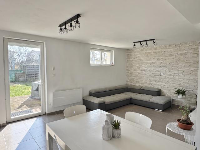 APPARTEMENT T4 EN REZ DE JARDIN AU GRAND CALME