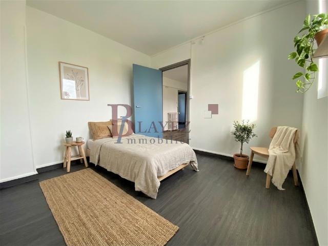 Appartement T4 fonctionnel avec balcon, parking et résidence sécurisée
