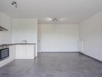 Appartement te huur in Hannut voor € 750 met 1 slaapkamer