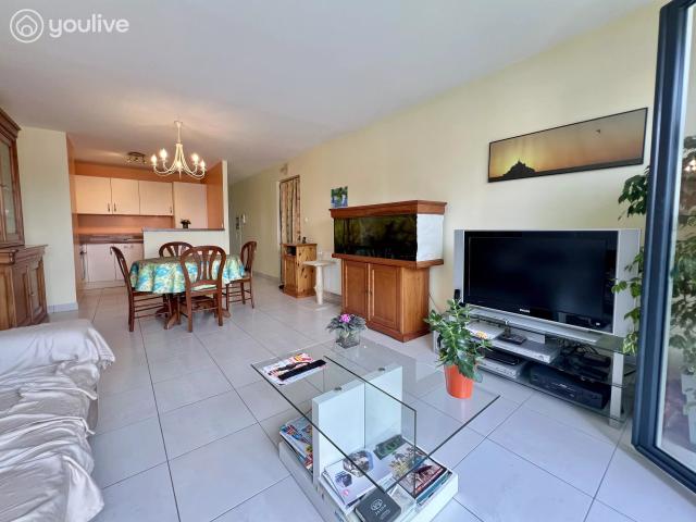 Appartement traversant au 6ᵉ étage – Vue dégagée – Parking privé