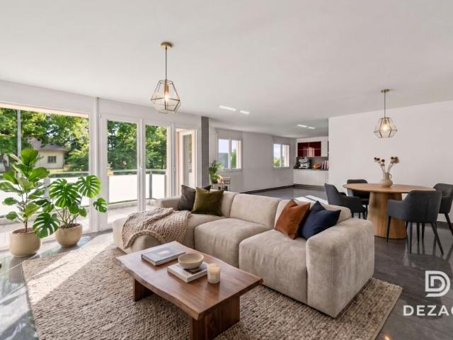 Appartement traversant aux volumes exceptionnels: 4 chambres et garage box !