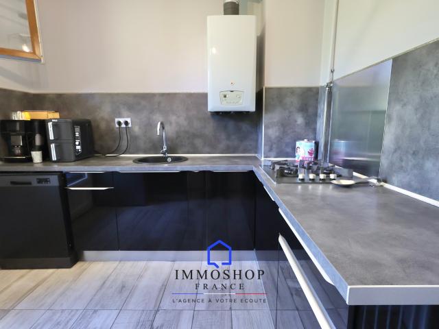APPARTEMENT TRAVERSANT DE TYPE T4 DE 96 M2 + BALCON