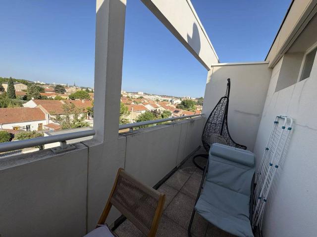 Appartement type 3 avec balcon + place de parking résidence séc
