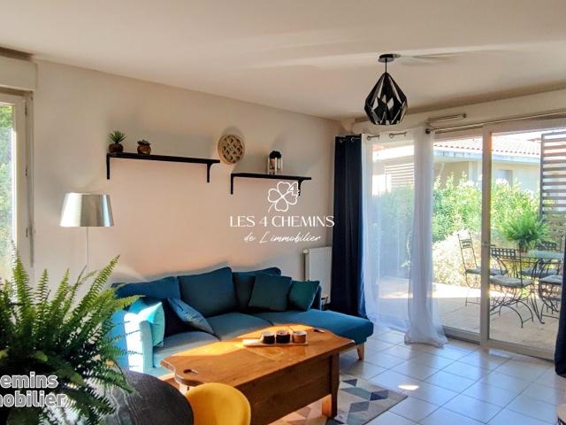 Appartement à louer 3 pièces de 63 m2 avec terrasse et 2 Places parking en sous sol