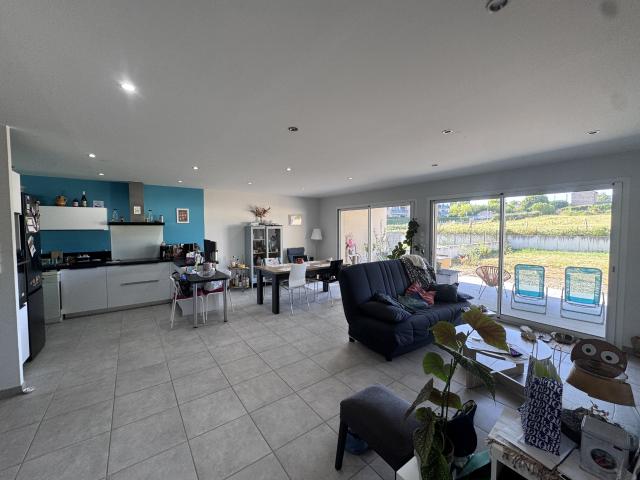 Appartement avec garage, jardin, terrasse et 3 chambres