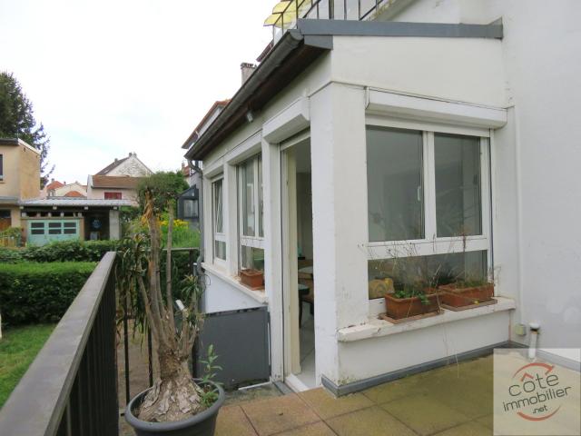 APPARTEMENT AVEC JARDIN PRIVATIF ET GARAGE