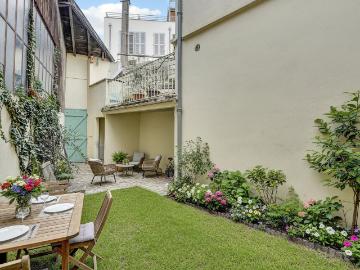 APPARTEMENT BAS COTE PAVEE