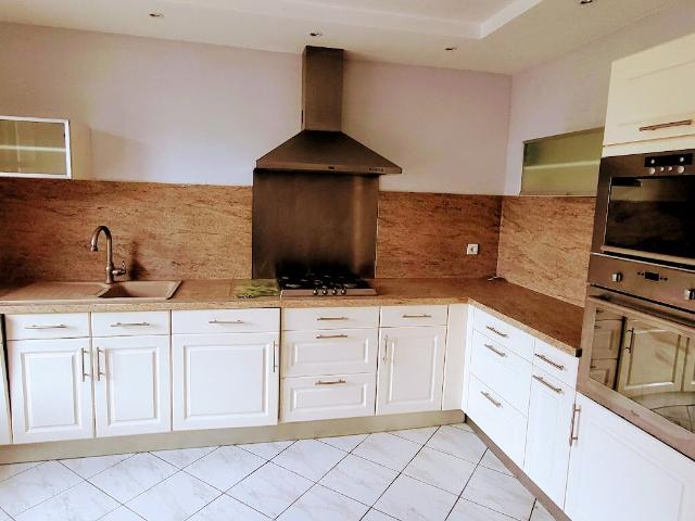 APPARTEMENT DANS MAISON 95.42 M2 avec jardin
